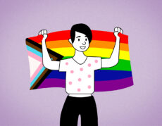 person holding pride flag